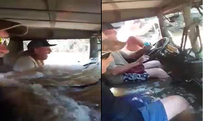 Nước ngập tới vô lăng, xe bán tải vẫn lao băng băng như tàu ngầm