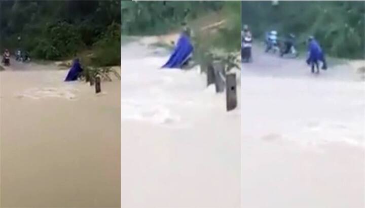 Video: Giáo viên ở Nghệ An bám thành cầu vượt lũ đến trường
