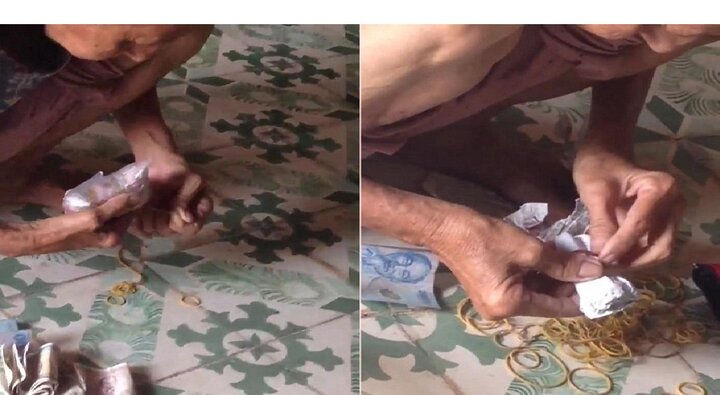 Clip cụ bà cặm cụi gỡ tiền lẻ trong bọc nilon chằng chịt dây chun khiến dân mạng xót xa