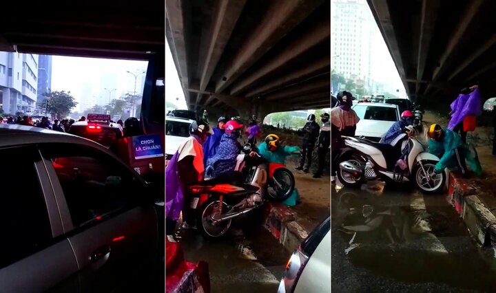 Clip: Đường vành đai 3 'tê liệt', dân đua nhau bê xe máy qua thảm cỏ để thoát tắc đường