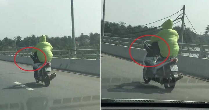 Clip: Thanh niên lái xe máy bằng chân trên cầu vượt biển dài nhất Việt Nam
