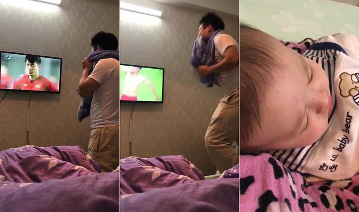 Clip: Sợ con thức giấc, ông bố trẻ ngậm khăn 'âm thầm' cổ vũ U23 Việt Nam