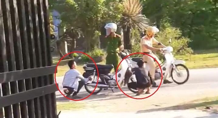 Clip: Không đội mũ bảo hiểm, 2 thanh niên bị CSGT phạt... xịt lốp xe