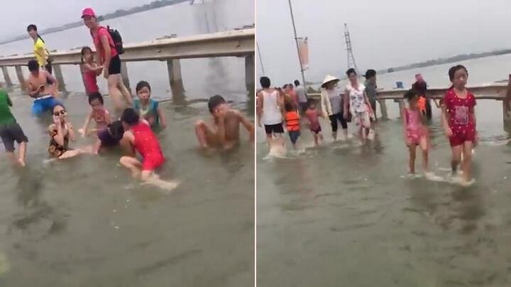 Clip: Tỉnh lộ ngập nước, dân Thủ đô nô nức mang phao ra tắm