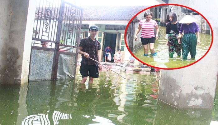 Nước vẫn mênh mông ngập xóm làng, dân Thủ đô mang cần câu cá trước cổng nhà