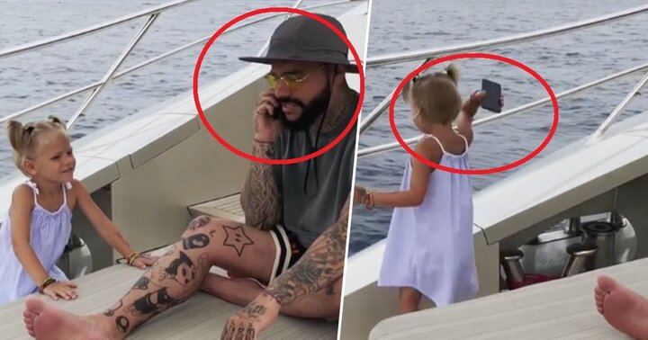 Clip: Thấy bố mải nói chuyện điện thoại, bé gái làm điều khiến người xem đứng hình