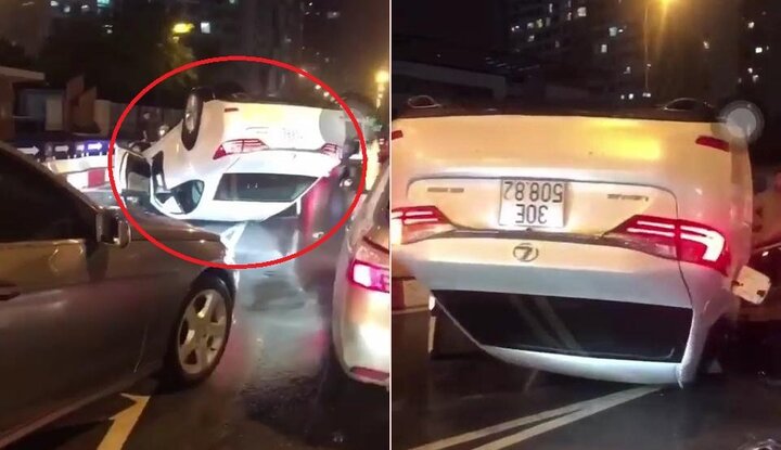 Clip: Ô tô Lexus lật ngửa, phơi bụng trên phố Hà Nội