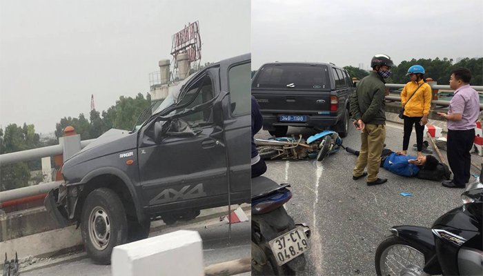 Ô tô biển xanh đâm vào dải phân cách trước khi tông 2 xe máy trên cầu Thanh Trì, Hà Nội