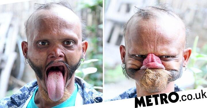 Kỳ lạ người đàn ông có thể dùng lưỡi liếm trán