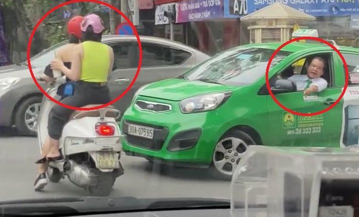 Clip: Dừng đèn đỏ nghênh ngang còn đôi co với tài xế taxi, 2 cô gái lĩnh trái đắng