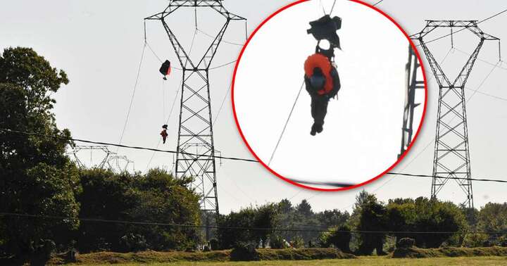 Chiến cơ F-16 rơi, phi công mắc kẹt trên đường điện cao thế