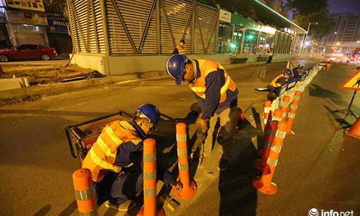 Ảnh: Thâu đêm lắp dải phân cách cứng phân làn cho xe buýt nhanh