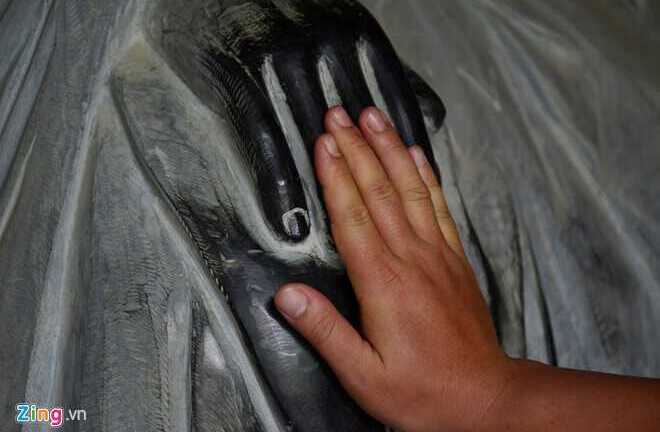 Ảnh: Trào lưu nhét tiền, xoa tay tượng phật ở chùa Bái Đính