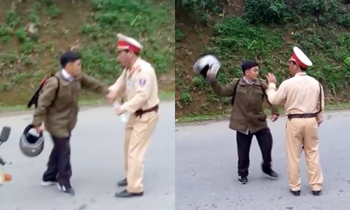 Tài xế giật gậy điều khiển, cầm mũ bảo hiểm dọa đánh CSGT
