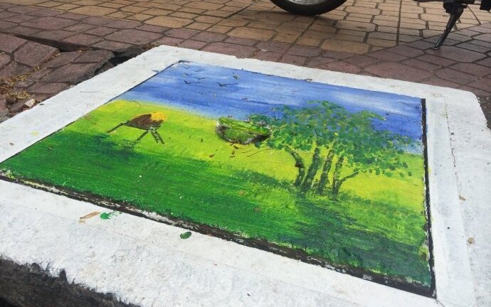 Đồng ý đề nghị vẽ tranh trên nắp cống của ông Đoàn Ngọc Hải