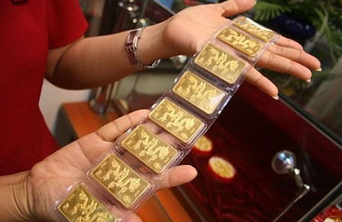 USD tăng nóng, vàng ảm đạm