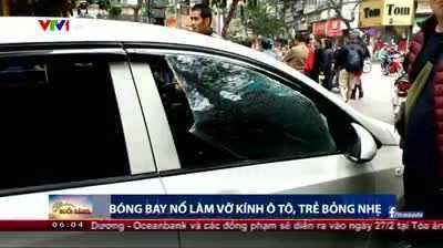 Bóng bay nổ vỡ kính ôtô, người trong xe cháy tóc, bỏng mặt