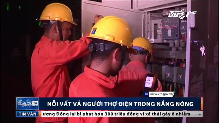 Thợ điện căng mình trong nắng nóng như thiêu đốt giữa chảo lửa Thủ đô