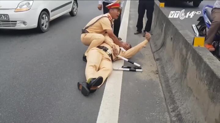 Tài xế container hất văng CSGT xuống đường sẽ bị xử lý thế nào?