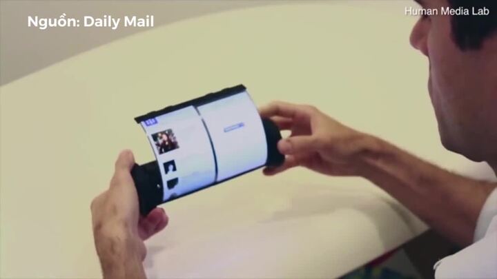 Cận cảnh máy tính bảng hình ống giấy, có thể cuộn tự do hoặc bật phẳng