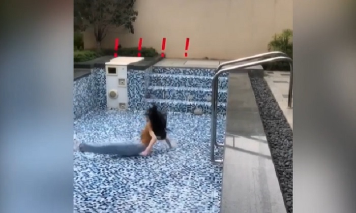 Cô gái ê ẩm vì nhảy xuống hồ bơi không có nước