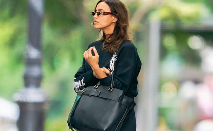 Irina Shayk để mặt mộc, mặc đồ 'đen cả cây' ra phố sau ồn ào tái hợp tình cũ