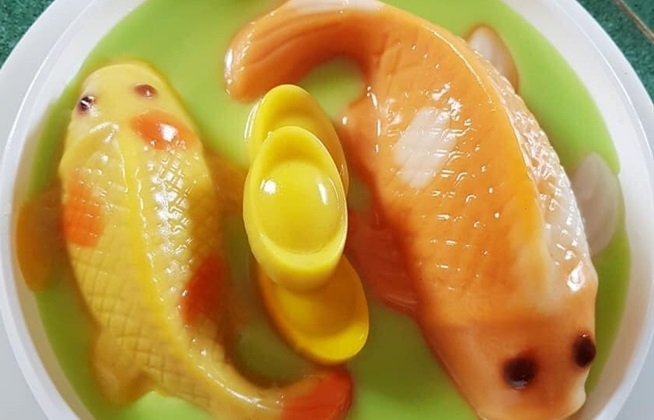 Xôi, bánh cá chép hút khách dịp Tết ông Công ông Táo 