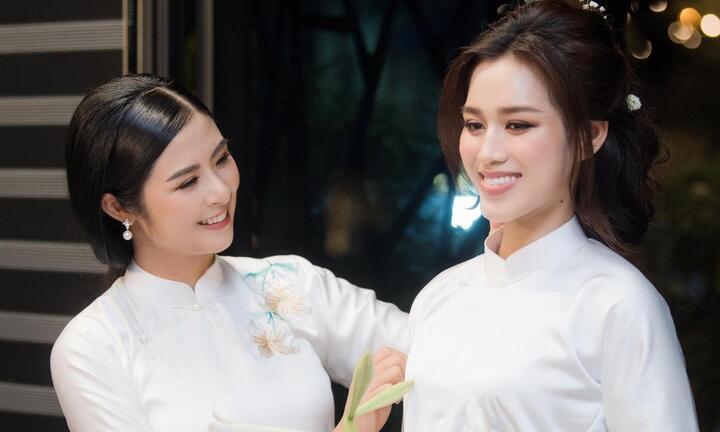 Đỗ Thị Hà đẹp mong manh với áo dài trắng, diễn thời trang cùng đàn chị Ngọc Hân