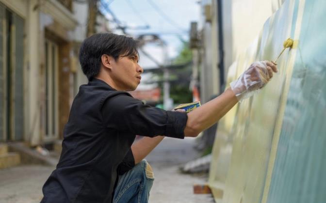 Chàng trai 8X lưu giữ hồi ức TP.HCM thông qua những bảng hiệu vẽ tay