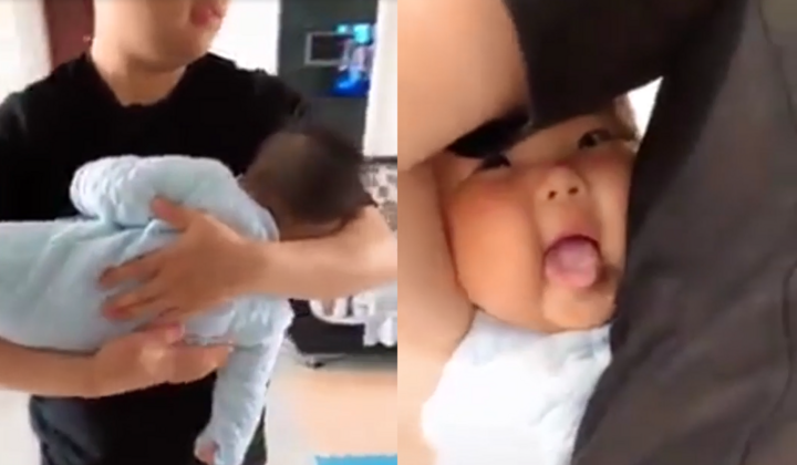 'Cưng xỉu' ngắm em bé giả vờ ngủ khi được bố bế 
