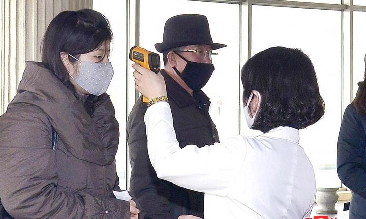 Triều Tiên bỏ quy định đeo khẩu trang sau khi tuyên bố chiến thắng COVID-19