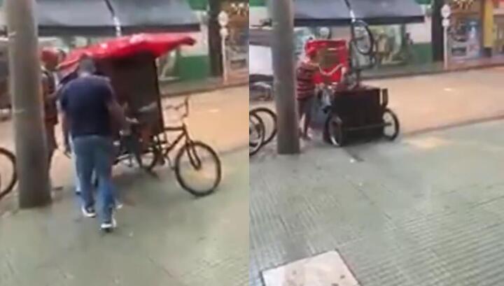 Xe xích lô lật ngửa dưới sức nặng của khách 