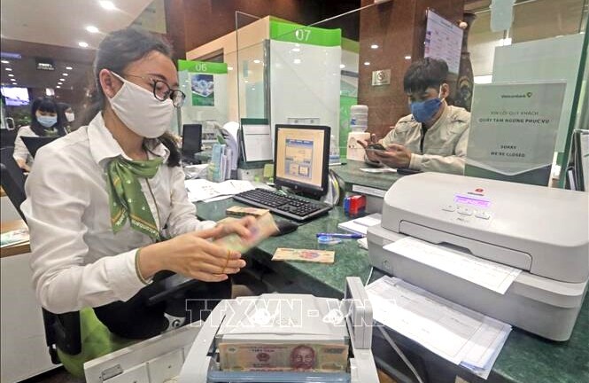 Ngân hàng thương mại tăng giảm lãi suất phải báo cáo Ngân hàng Nhà nước