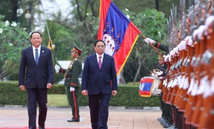 Lễ đón chính thức Thủ tướng Phạm Minh Chính thăm CHDCND Lào