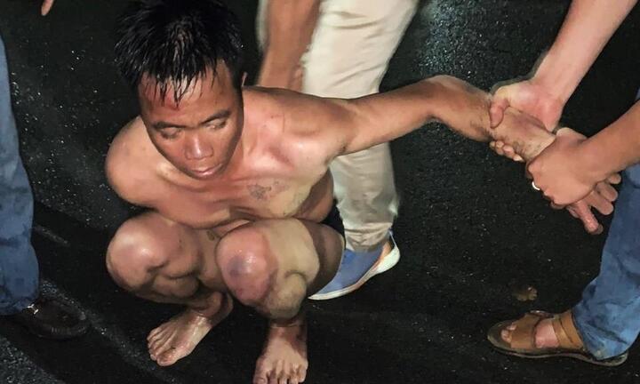 Bị công an truy đuổi, đối tượng trốn truy nã lao xuống hồ ẩn nấp trong 2 giờ