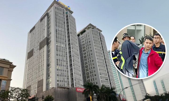 Nghẹt thở giây phút cứu cô gái cầm dao đứng trên nóc chung cư định tự tử