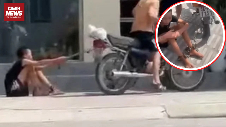 Phẫn nộ hình ảnh bé trai bị bố xích chân kéo lê trên đường phố Hải Phòng