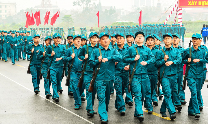 Tham gia dân quân tự vệ có được miễn nghĩa vụ quân sự không?