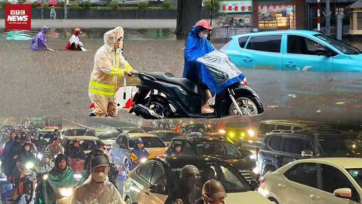 Người dân Hà Nội vật lộn với biển nước trong giờ tan tầm