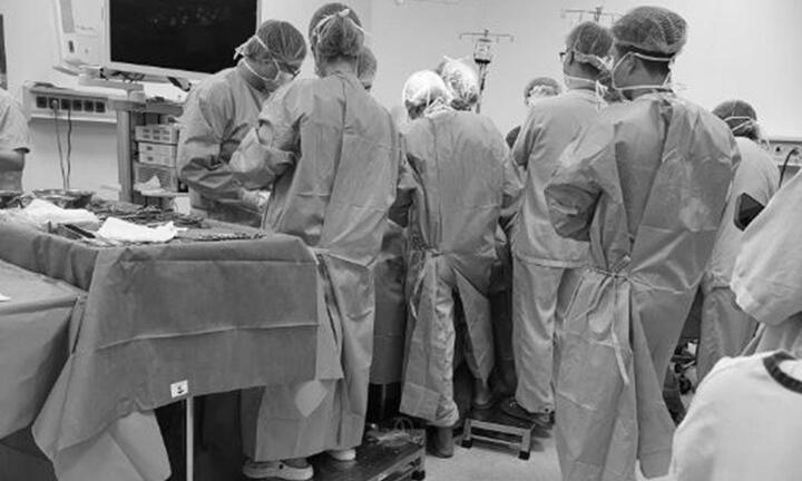 Nearly 50 doctors and nurses watched in heartbreak as the 25-year-old passed away after enjoying a football match.