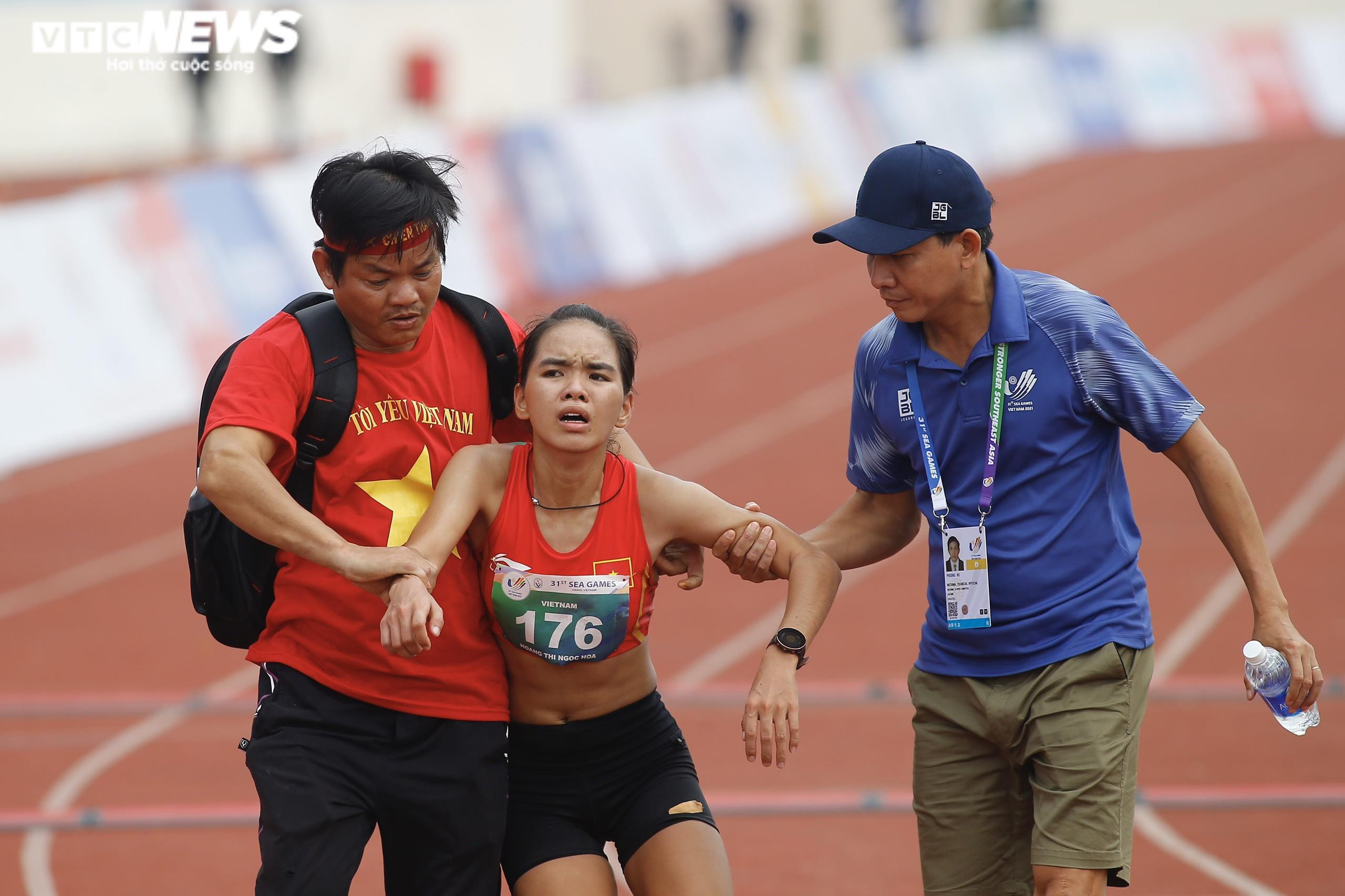 Nữ VĐV Việt Nam kiệt sức, nôn khan sau khi về đích marathon - 5