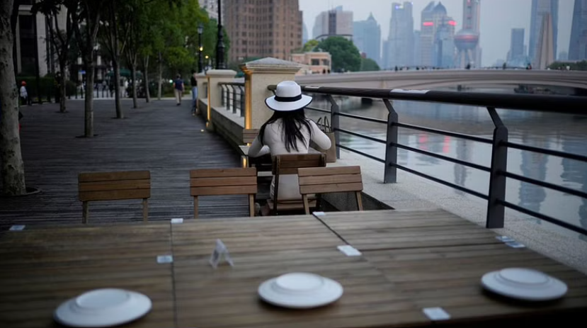 Mất việc 2 lần/năm, người trẻ Trung Quốc tìm cách vượt 'bão' suy thoái kinh tế - 2