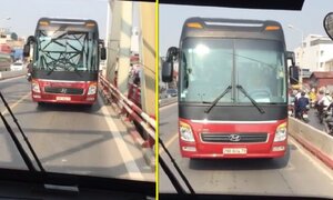 Đi vào đường ngược chiều, xe khách bật đèn khẩn cấp lùi trên cầu Chương Dương