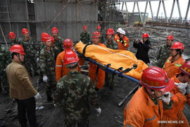 Ảnh: Hiện trường vụ sập giàn giáo thảm khốc khiến 74 người thiệt mạng ở Trung Quốc