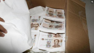 Trung Quốc triệt phá đường dây bán tiền giả theo cân