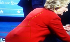 Bùng nổ nghi vấn Hillary Clinton đeo 'máy chống ho' khi tranh luận với Donald Trump