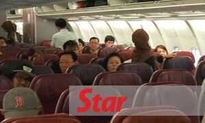 Đại sứ Triều Tiên đem nhiều hành lý, đầu thu TV khi lên máy bay rời Malaysia