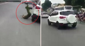 Ô tô nhấn ga lạng lách, tông ngã cảnh sát rồi bỏ chạy trên phố Hà Nội