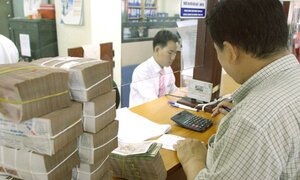 Xử lý nợ xấu, tái cơ cấu: Cấm dùng ngân hàng thao túng công ty sân sau