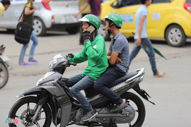 Vì sao khách đi GrabBike dịp Tết phải trả thêm phụ phí 10.000-20.000 đồng?